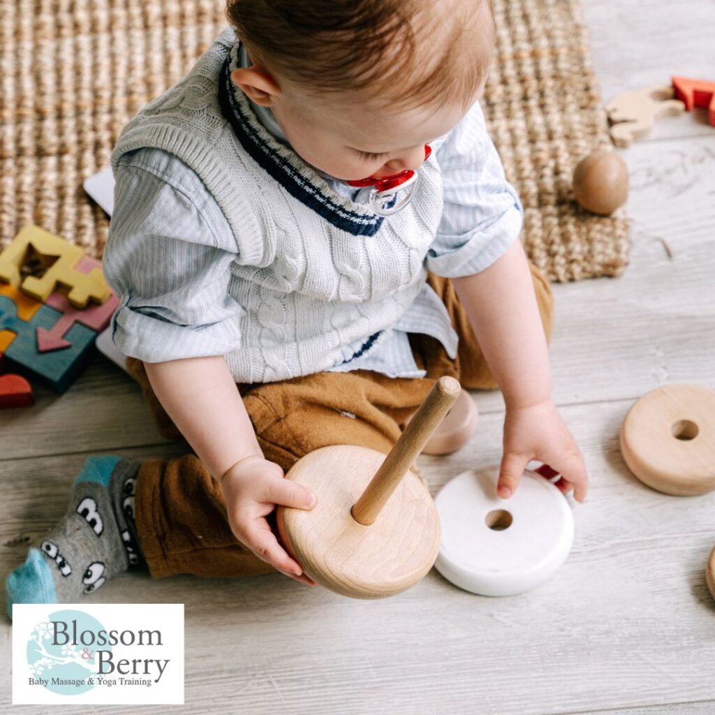 Right Brain Development in Babies: Tips to Nurture Creativity and Emotional Growth - picture of a baby playing with a toy on the floor